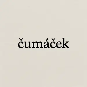 Jenom text: Čumáček. Malým písmem v žádném na zátylku