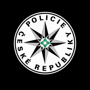 kulatý znak policie české republiky, kdy pozadí, které je od kulatého znaku je vyplněné černou barvou