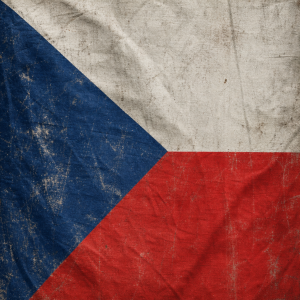 Česká vlajka na výšku bez nebe a stožáru ošoupaná